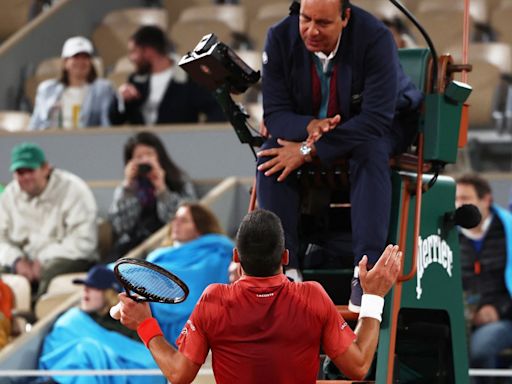 Djokovic argues with umpire as he creates French Open history in five-set win