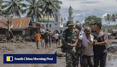 34 dead in Indonesia after Sumatra struck by floods, volcanic material