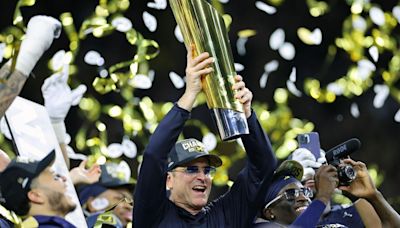Head coach Jim Harbaugh of the Michigan Wolverines celebrates after defeating the Washington Huskies during the 2024 CFP National Championship game at NRG Stadium...