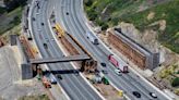 Girders swing in place for wildlife crossing over 101 Freeway in Agoura Hills