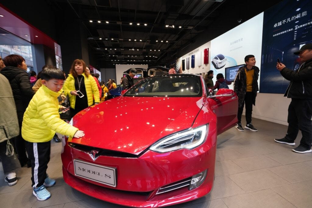 If You Had Invested $1000 In Tesla Stock When EV Giant Entered China Exactly 10 Years Ago...