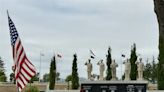 Ivy Lawn Memorial Park flying flags of military men and women in honor of Memorial Day