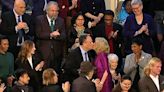 Jill Biden mocked over awkward kiss with Doug Emhoff at State of the Union