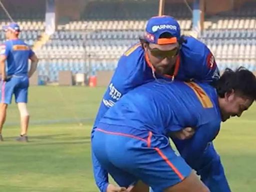 Watch: Ishan Kishan tests wrestling skills against Tim David | Cricket News - Times of India