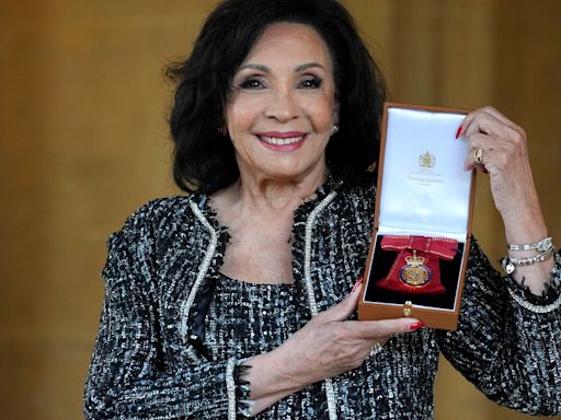 Shirley Bassey receives top honour from the King