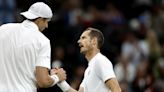 Andy Murray knocked out of Wimbledon by big-serving John Isner