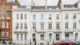 Stucco-fronted townhouse available to rent with views of J.M. Barrie's home