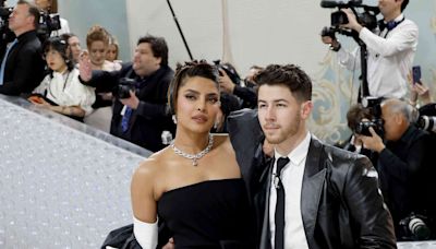 Priyanka Chopra and Nick Jonas Nail Wedding Guest Chic in Sweet PDA Photos