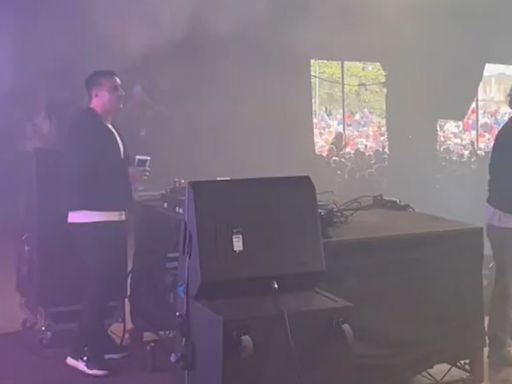 Gary Neville heads beach ball on stage as he makes DJ debut at Kendal Calling