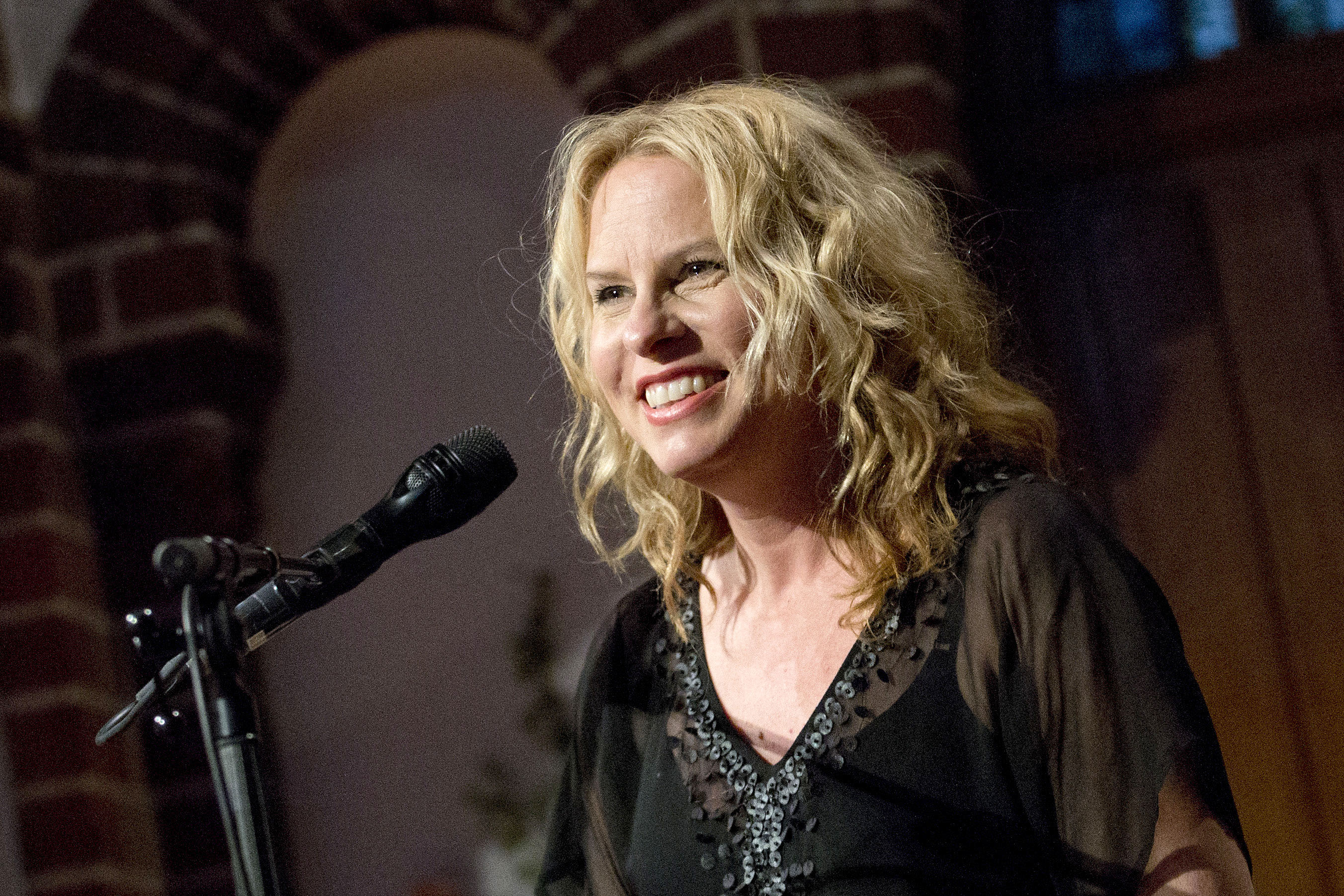 Singer-songwriter Vonda Shepard says people still 'jump out of their seats' when she performs the 'Ally McBeal' theme song