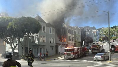 Large fire hits Alamo Square house in SF, 2 people hospitalized
