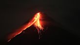 Thousands evacuated in Philippines as Mount Mayon volcano spews lava and sulfuric gas