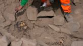 Archeologists find mummy surrounded by coca leaves on hilltop in Peru's capital