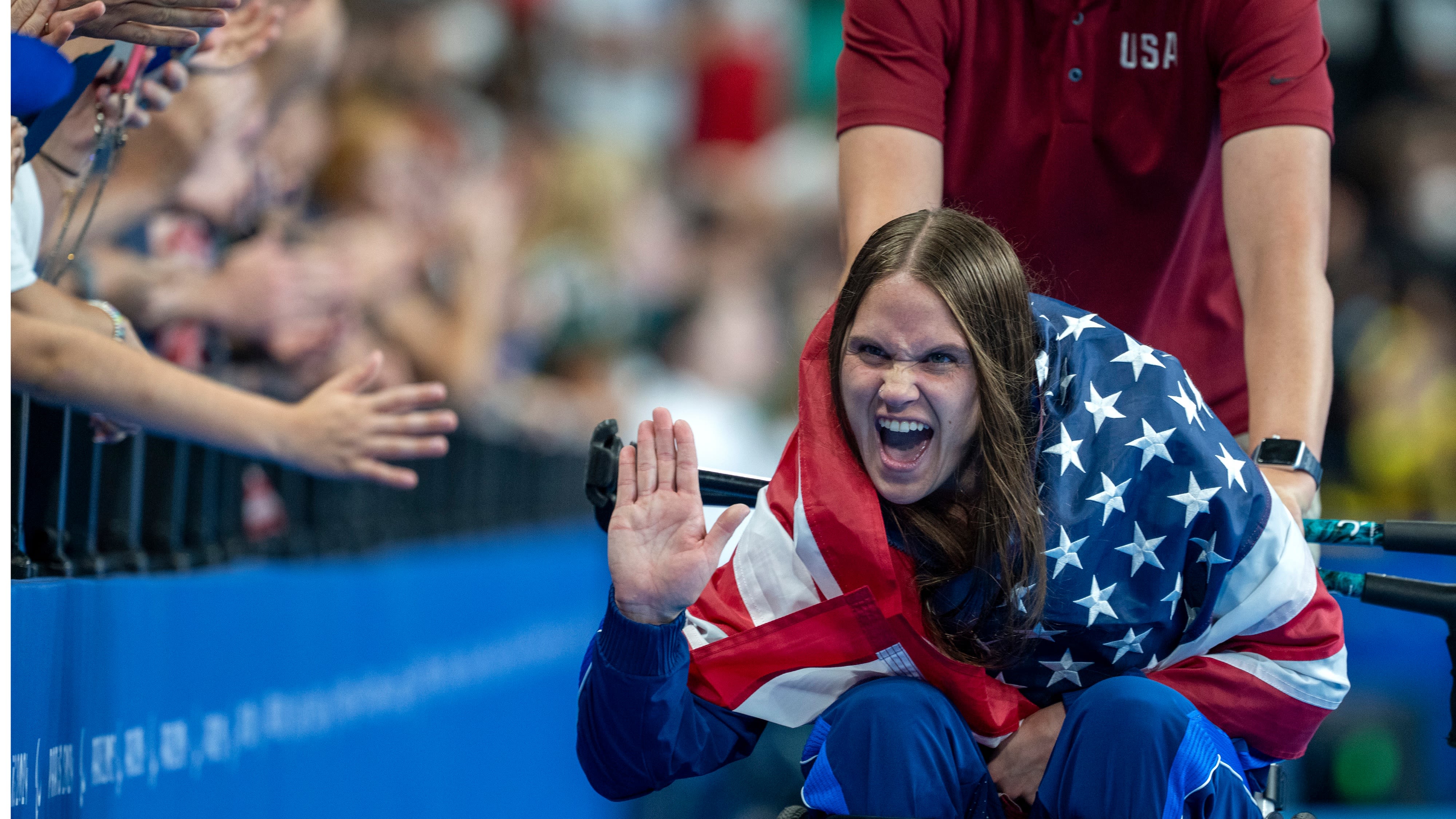 Paralympic swimmer wins gold after online backlash to her first medal