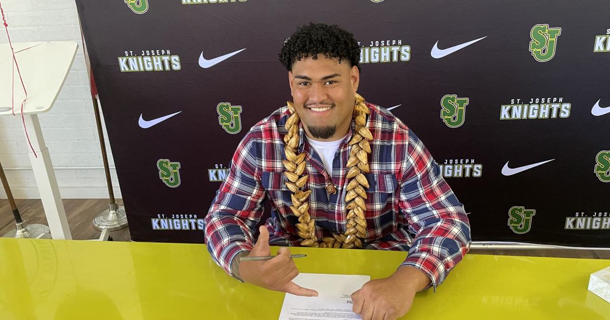 Hancock's Erwin Taomi signs with USC for offense
