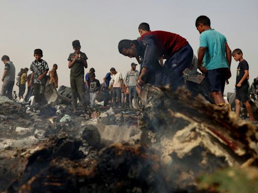 Israel faces global outcry over Gaza strike that set tent city ablaze