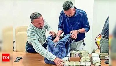 Two persons arrested with 2.14 crore in cash | Rajkot News - Times of India