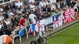 England fan wipes bare bottom on Sunderland flag inside St James' Park