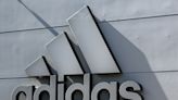 Adidas shares slide following China corruption claims