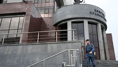 Russia convicts US journalist of spying in a trial widely seen as politically motivated