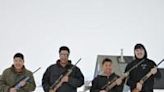 Peter Hammeken (2nd left) and his sons. Hunting is not just a way of life for the Inuit of Ittoqqortoormiit, it is needed for survival