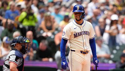 Luis Castillo steps in as a batter after injury forces Mariners to give up the designated hitter