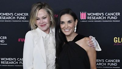 Demi Moore, Melanie Griffith reunite at cancer research benefit