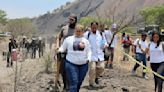 Mexican volunteers search for clandestine crematorium on outskirts of Mexico City