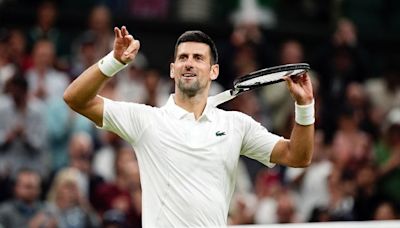 England celebrations briefly interrupt Novak Djokovic’s progression at Wimbledon