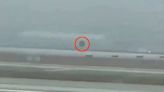 Moment WHEEL flies off Boeing plane during take-off & bounces along runway