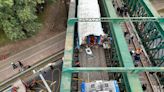 A train in central Buenos Aires strikes a boxcar on the track, injuring dozens