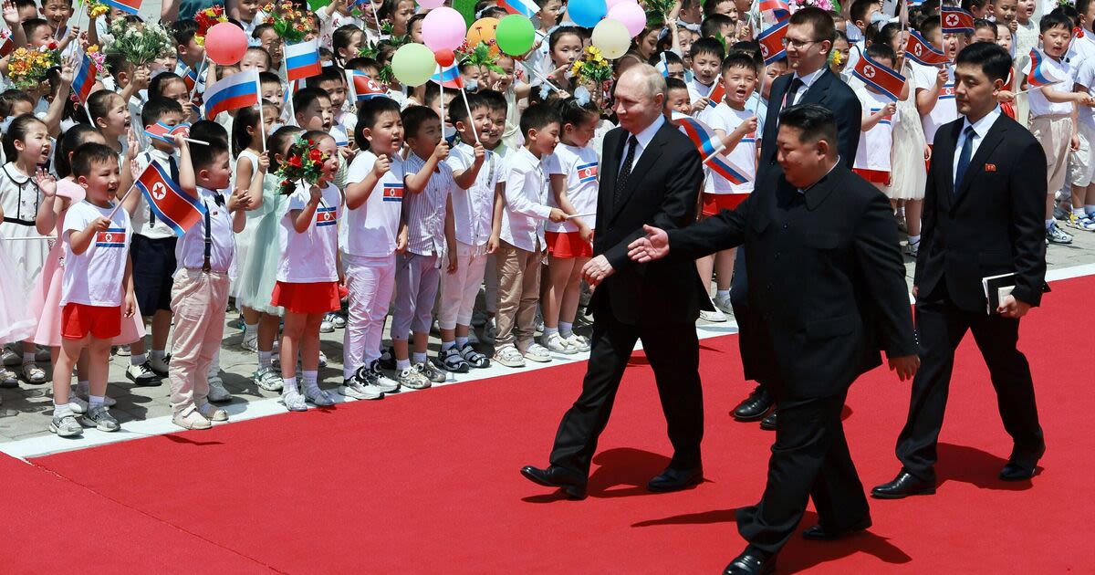 Rare pictures inside North Korea show streets decked out with Putin posters