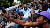 Haitian politician allied with a coup leader rejects offer to join U.S.-backed transition