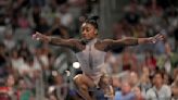 Simone Biles cruises to 9th national title and gives Olympic champ Sunisa Lee a boost along the way