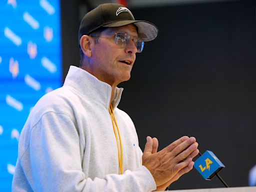 Chargers' Jim Harbaugh denies accusations against Michigan staff in NCAA notice of allegations