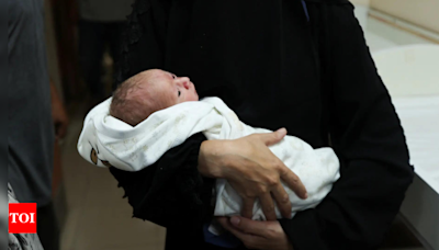 'Miracle': Gaza baby saved from dead mother's womb after Israeli airstrike - Times of India