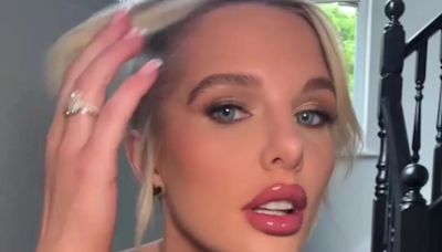 Busty Helen Flanagan looks incredible in plunging leopard print dress