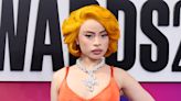 Ice Spice Is a Vixen in Vintage Versace Gown That Dips Below Her Belly Button at 2024 BET Awards