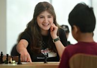 Chess kids huddle at New Canaan Library for day of games under eye of award-winning St. Luke s player