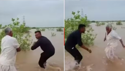 Father-Son Duo Groove Amid Pouring Rain In Gujarat, Video Will Leave You Smiling