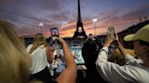 Beach volleyball at Eiffel Tower stadium draws the crowds looking for the perfect social media post