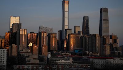 China holds back on more stimulus, citing necessary 'pain'