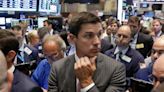 Nasdaq slips, Dow rises as Wall Street weighs inflation data: Stock market news today