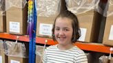 Girl who cut off 13 inches of hair to make cancer wig eyes world record