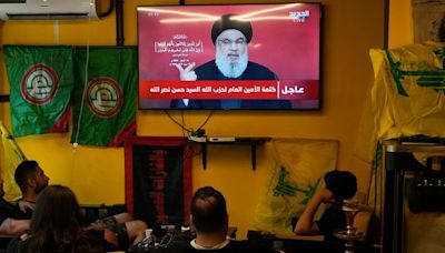 Hezbollah leader Hassan Nasrallah calmly vows 'punishment' for trojan-horse blasts