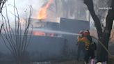 Riverside wildfire guts homes; officials say suspects who lit fireworks were seen on camera