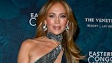 JLo's chestnut brown cupboards in her low lit kitchen are giving us deep wood decor inspiration