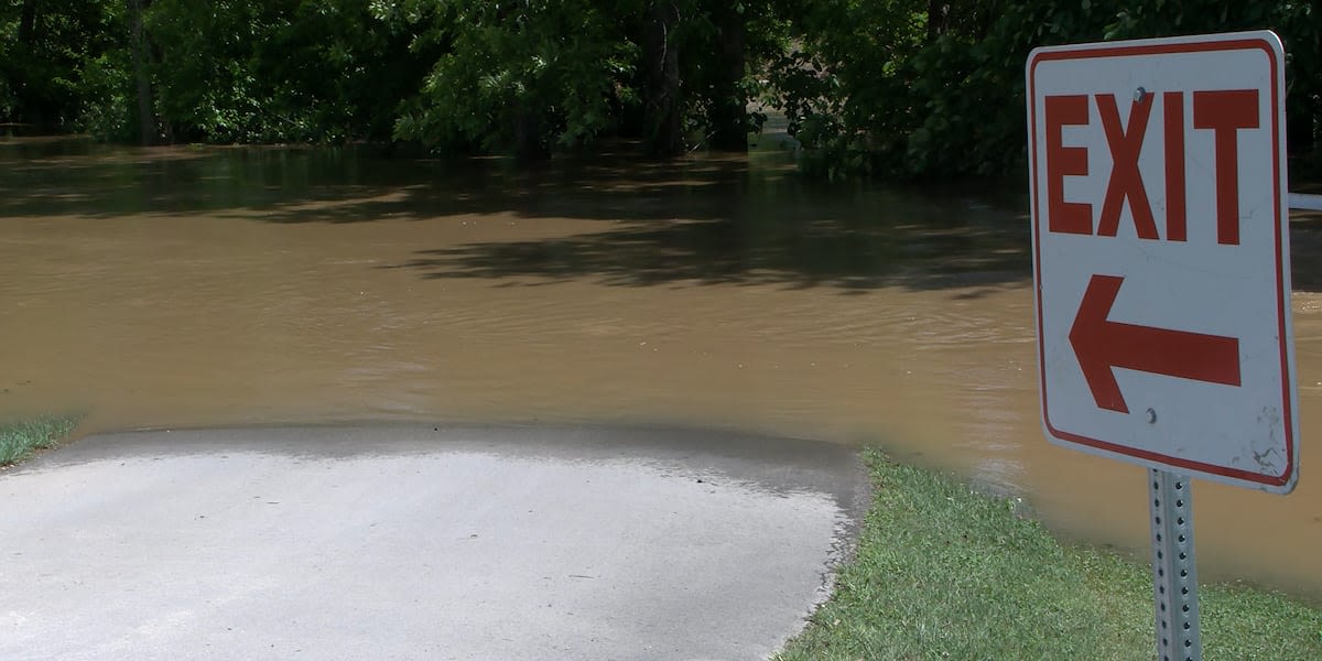 Officials warn people about park flood waters