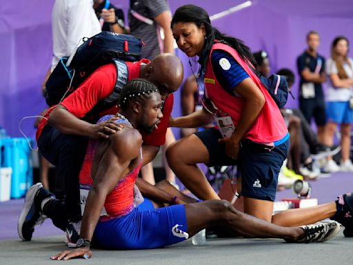 Noah Lyles won bronze in the 200m final with COVID? Why is this shot-putter's hand so big? Your Olympic health questions answered.