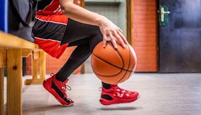 Teacher sues state school after playing basketball in heels
